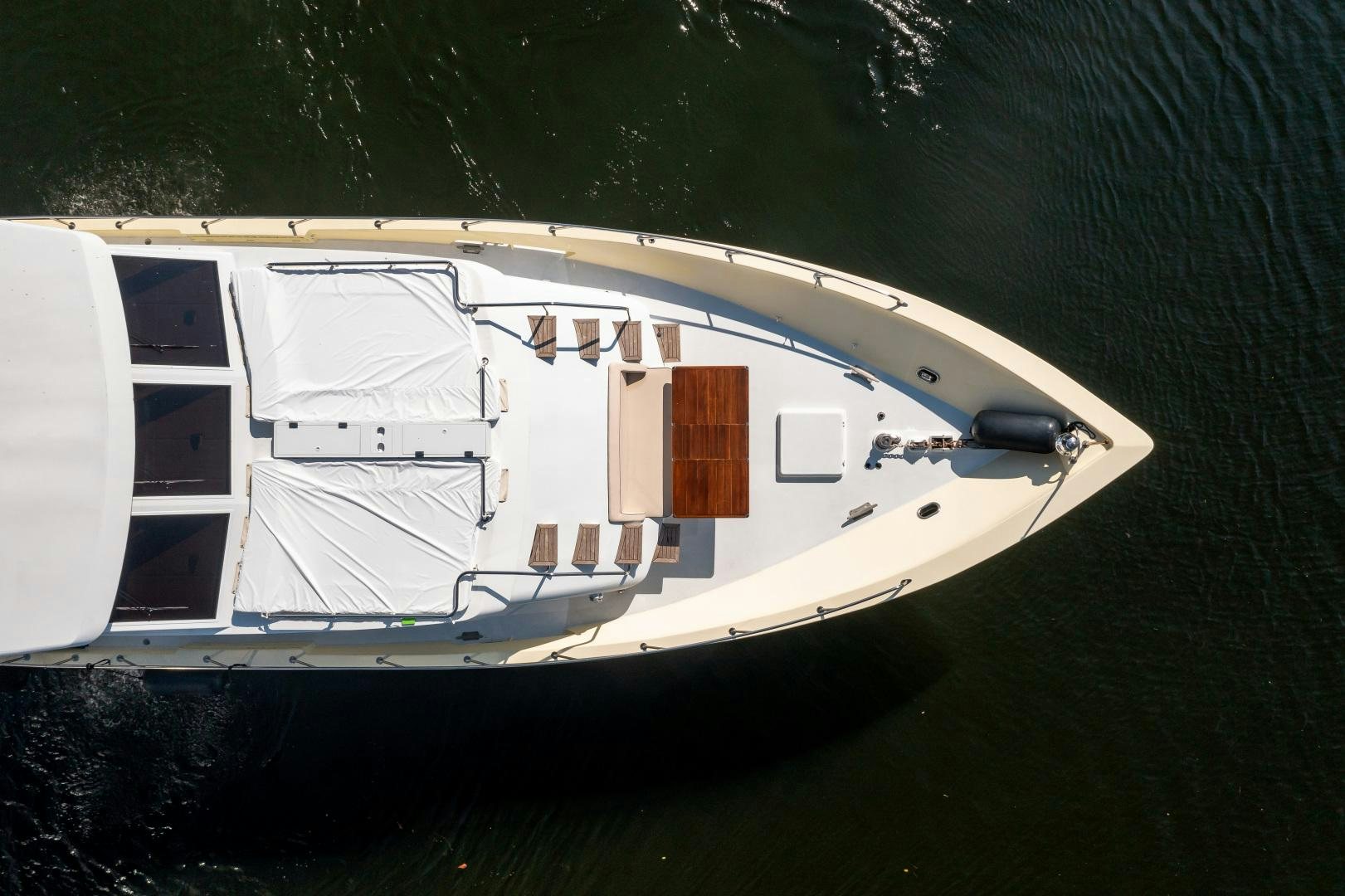 a white yacht in the water aboard A PLACE IN THE SUN Yacht for Sale