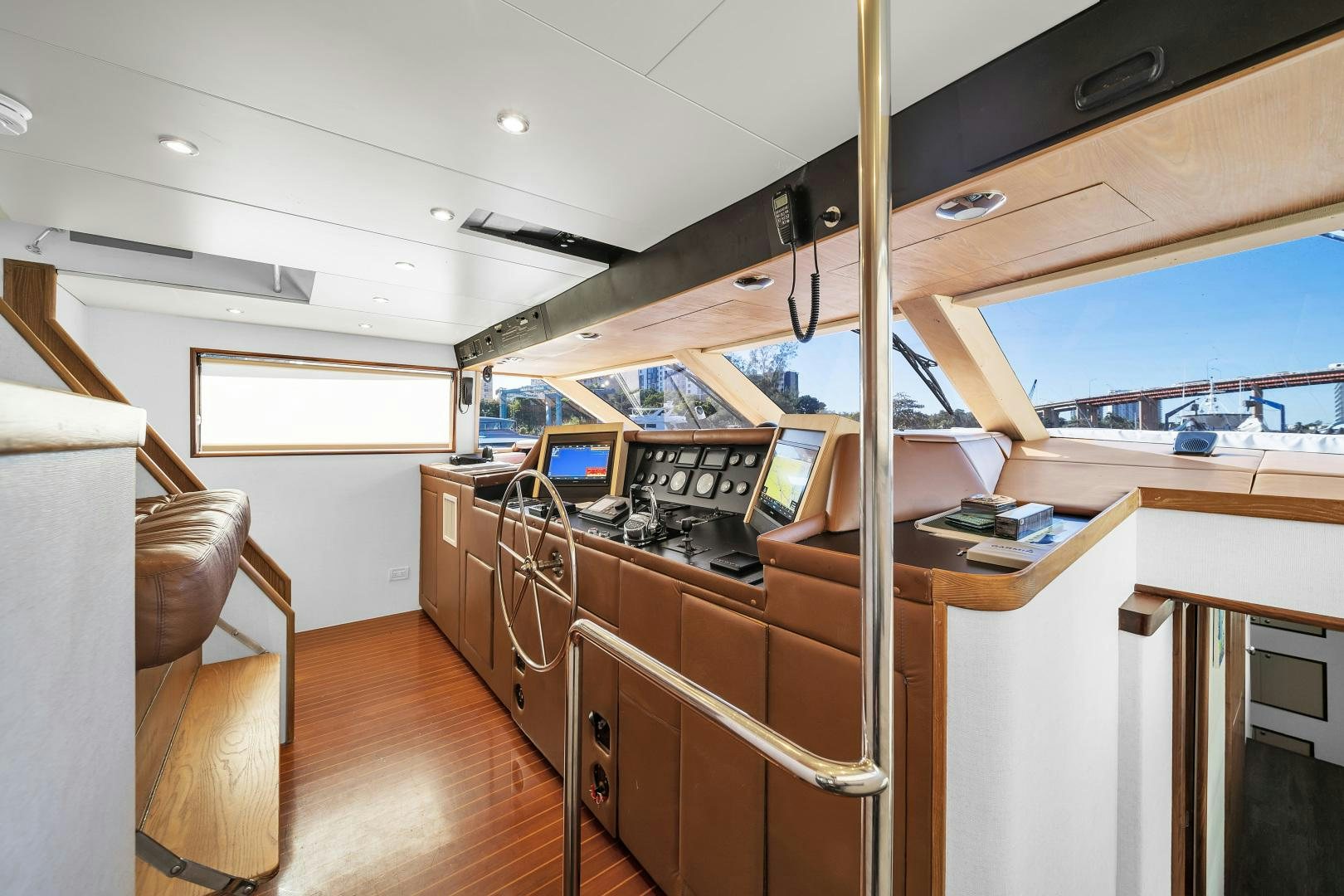 a room with a desk and a bed aboard A PLACE IN THE SUN Yacht for Sale