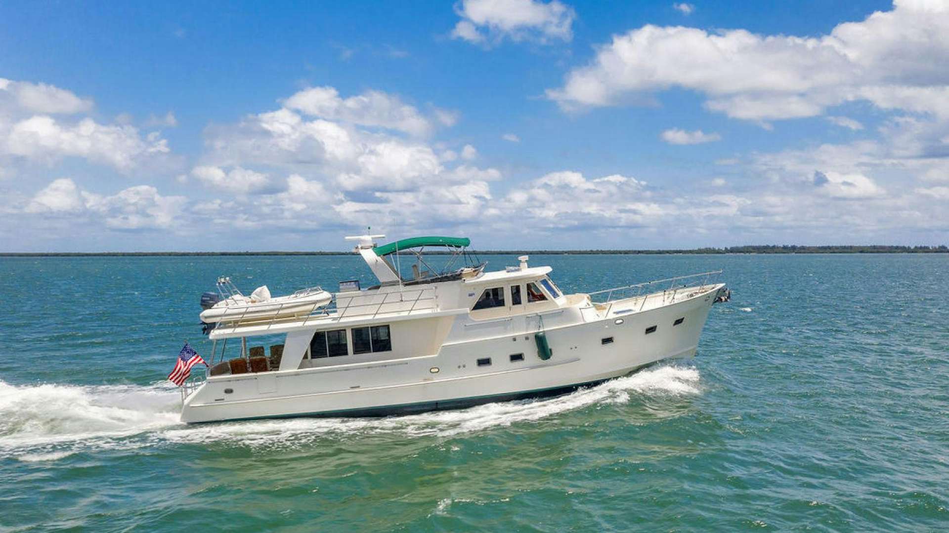a boat in the water aboard INDIAN SUMMER Yacht for Sale