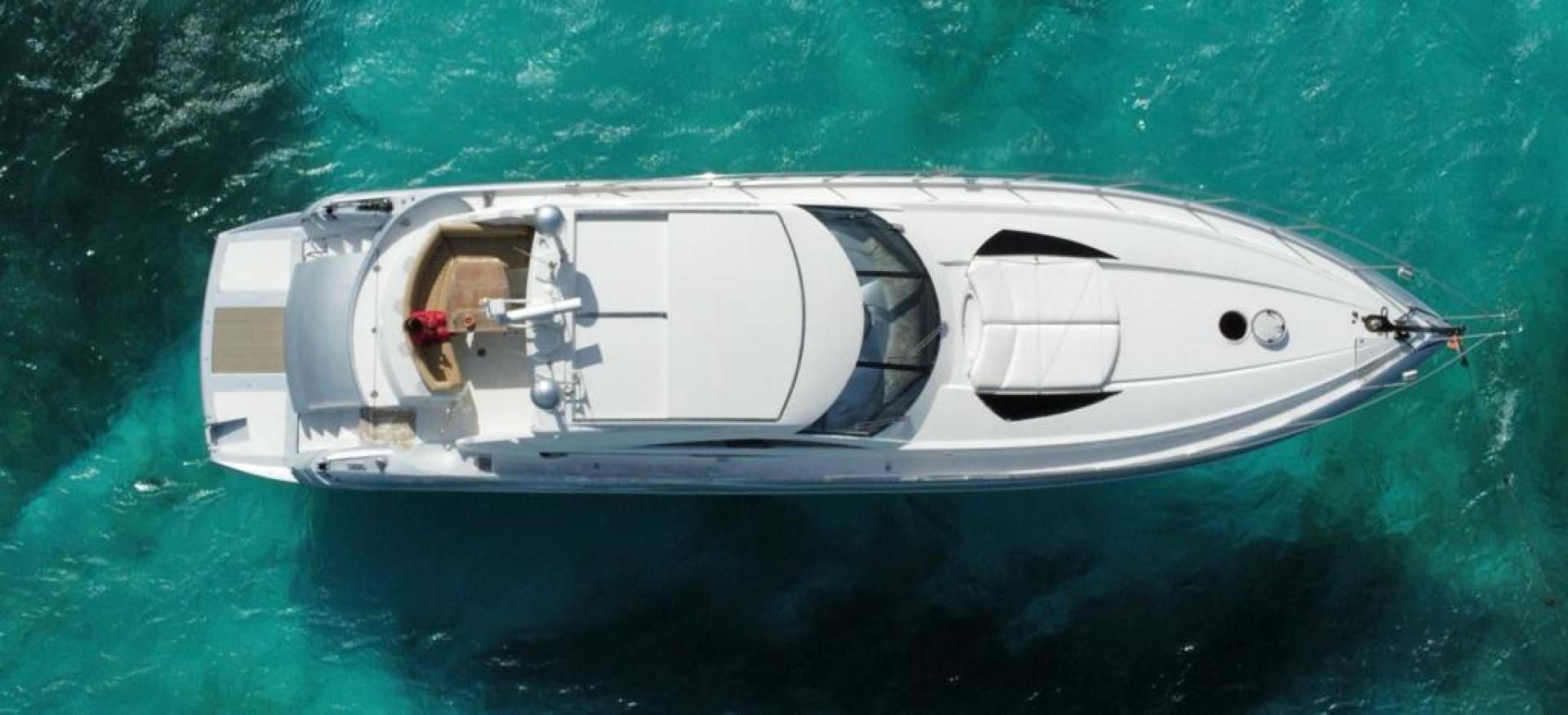 a white boat in the water aboard Highlander Yacht for Sale
