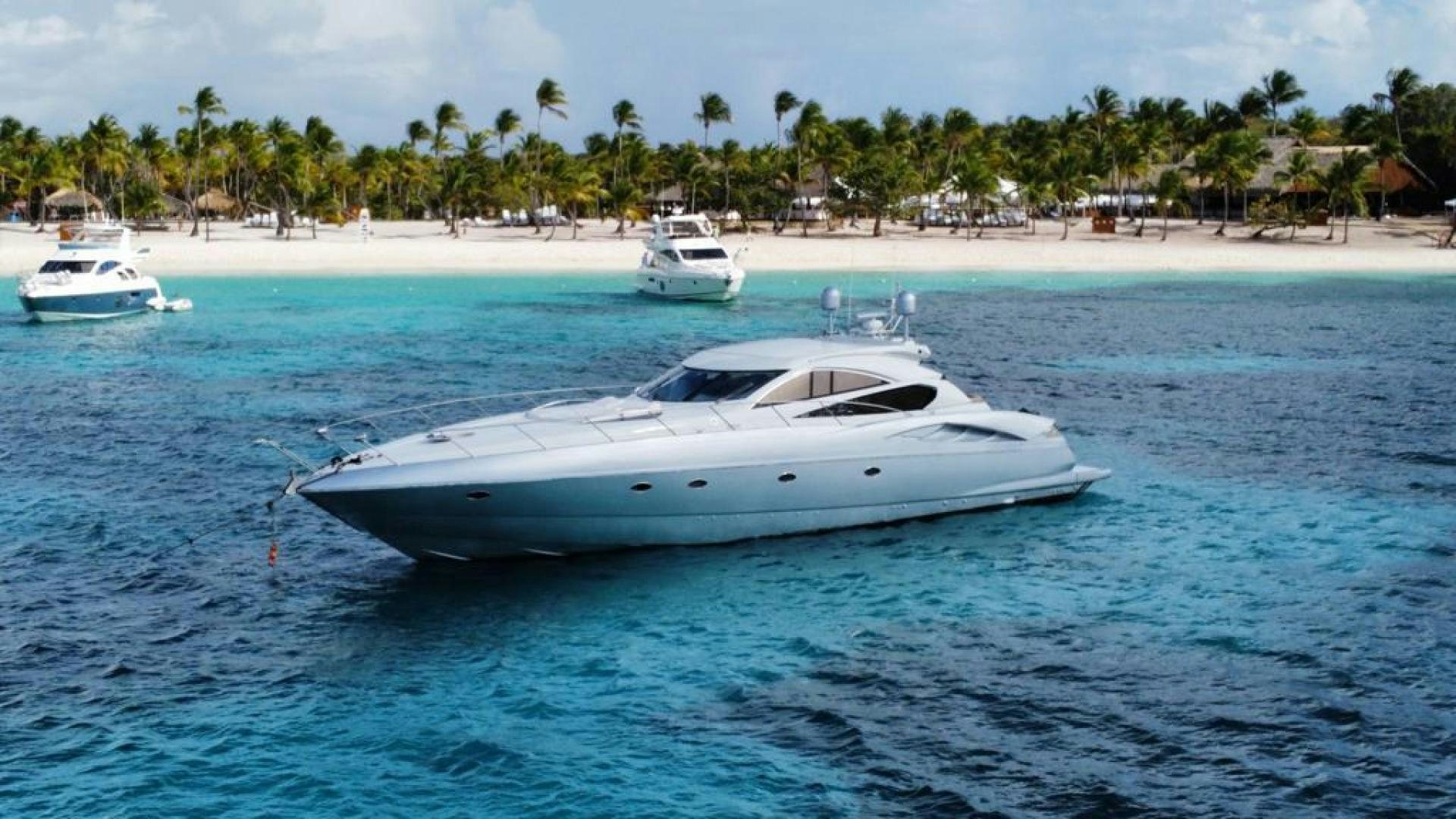 a couple of white boats in the water aboard Highlander Yacht for Sale