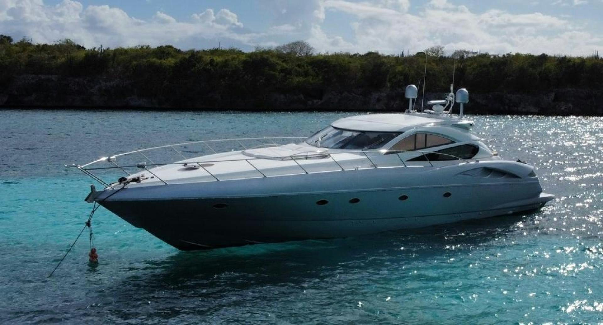 a white boat in the water aboard Highlander Yacht for Sale