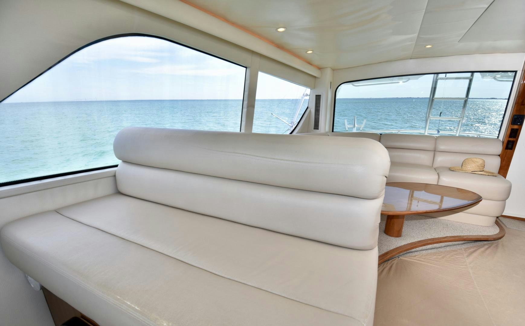 a couch in a car aboard Hoof Hearted Yacht for Sale