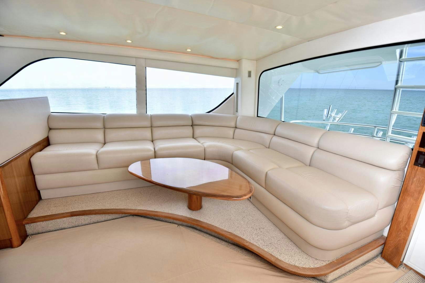 a couch in a room aboard Hoof Hearted Yacht for Sale