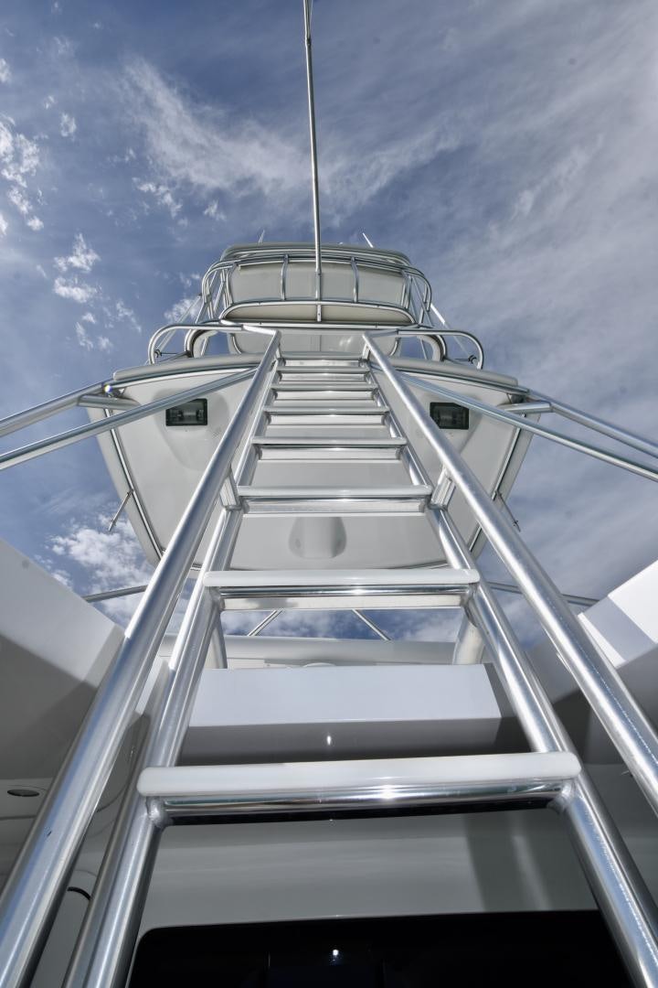 a white boat on a sunny day aboard Hoof Hearted Yacht for Sale