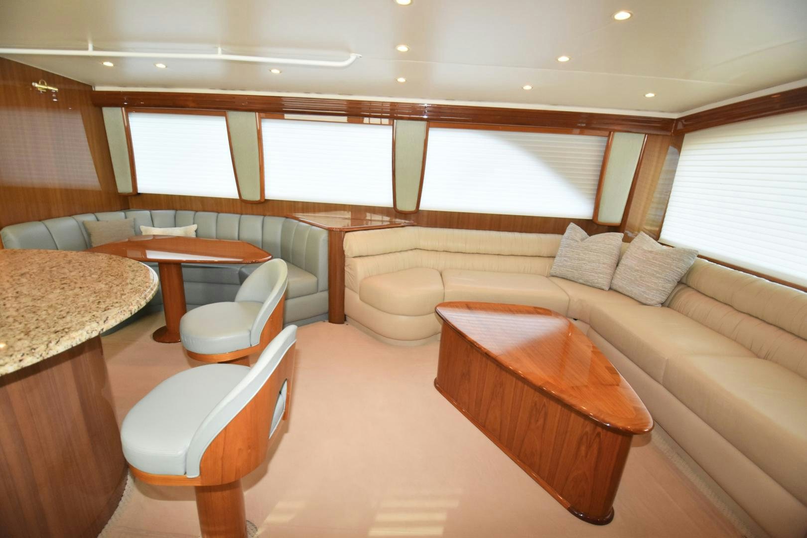 a room with a couch and a table aboard Hoof Hearted Yacht for Sale