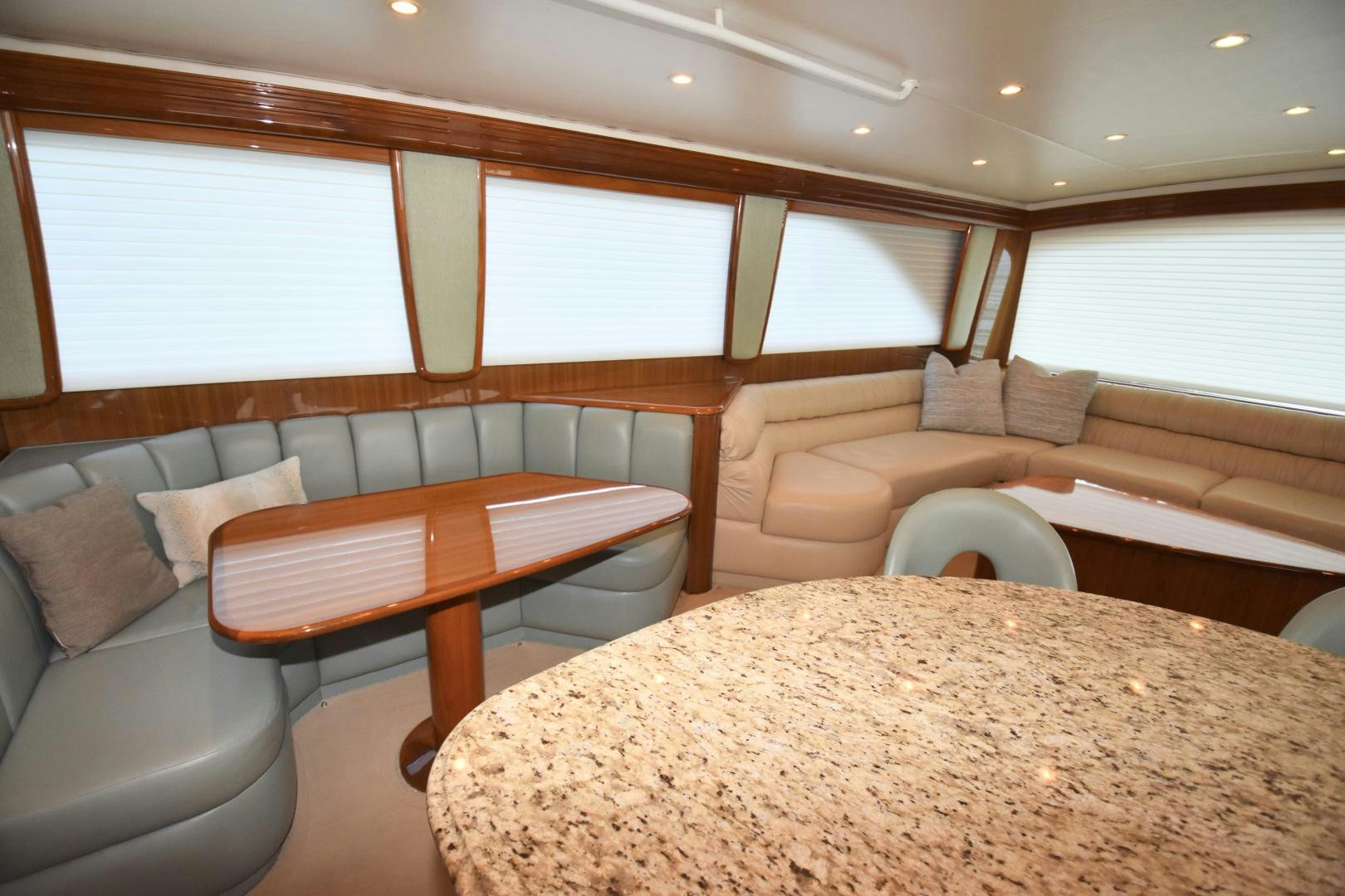 a room with a table and chairs aboard Hoof Hearted Yacht for Sale