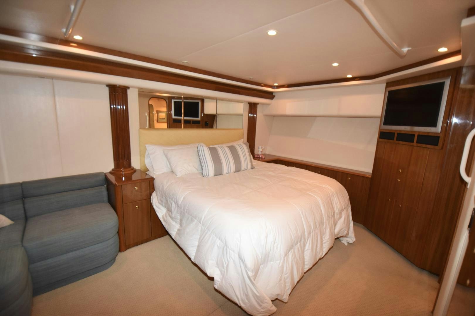 a bed in a room aboard Hoof Hearted Yacht for Sale