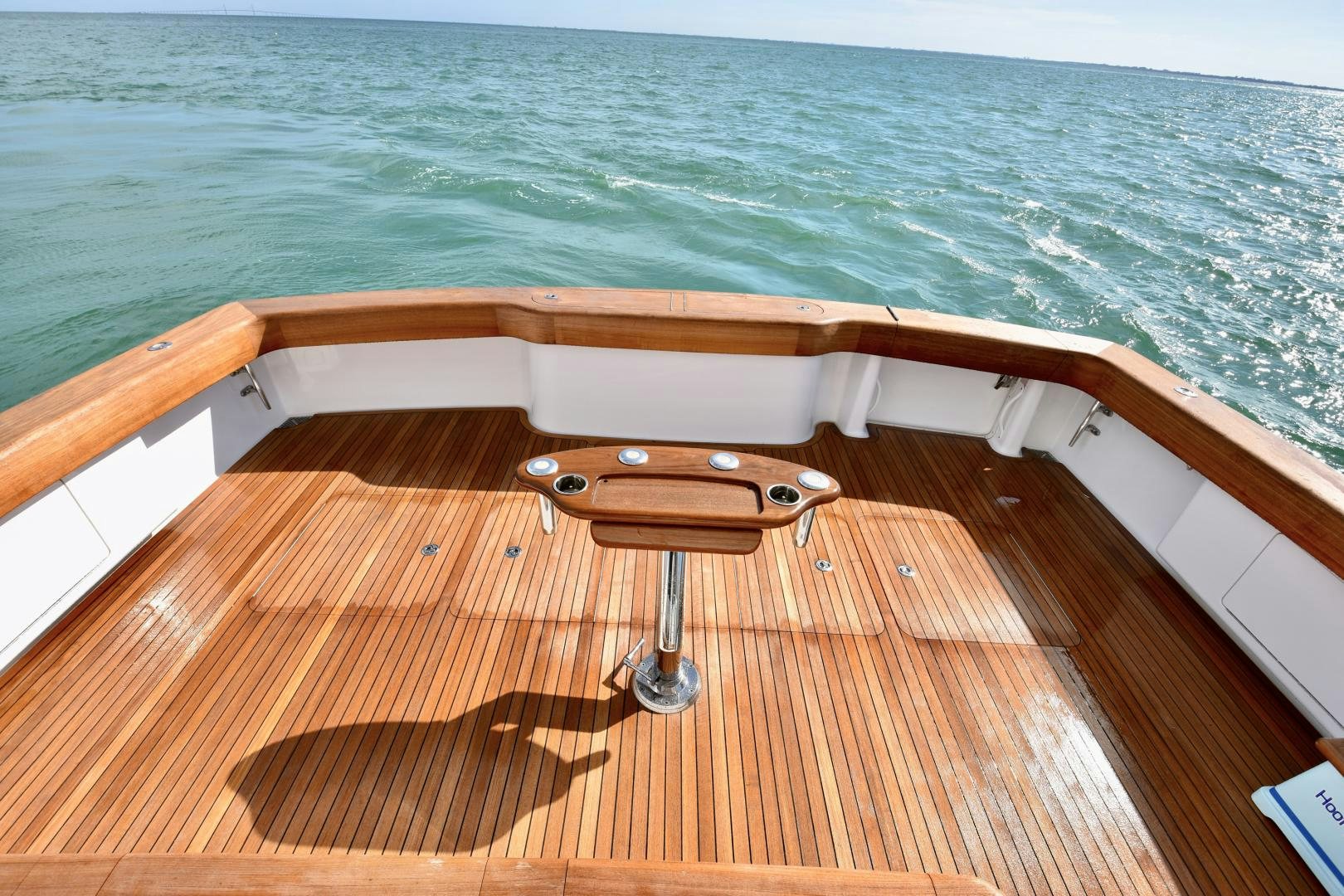 a wooden boat on a body of water aboard Hoof Hearted Yacht for Sale