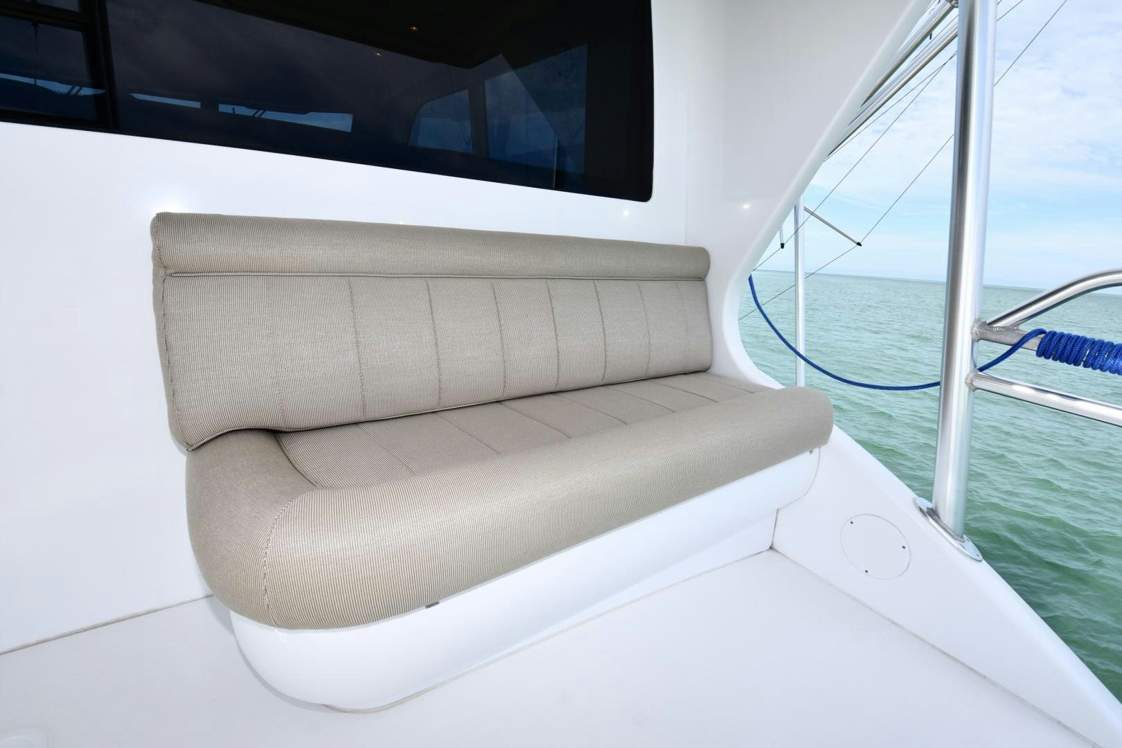 a white couch on a boat aboard Hoof Hearted Yacht for Sale