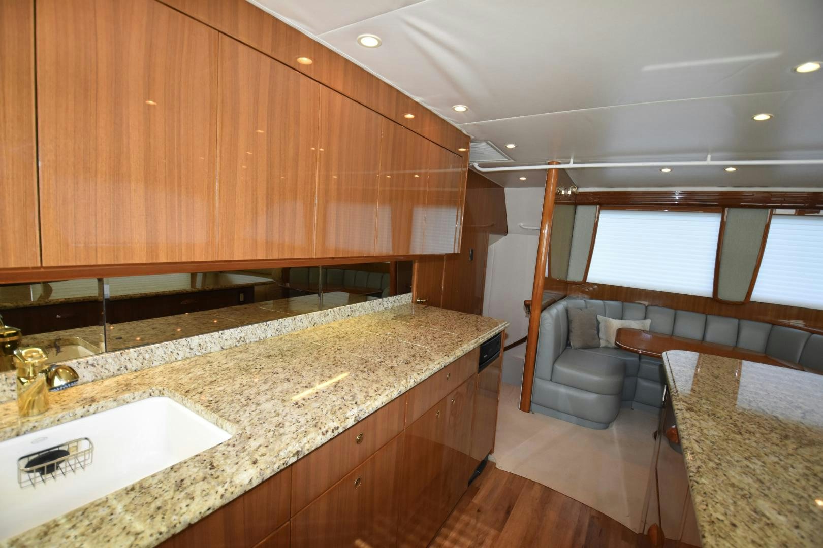 a kitchen with a large island aboard Hoof Hearted Yacht for Sale