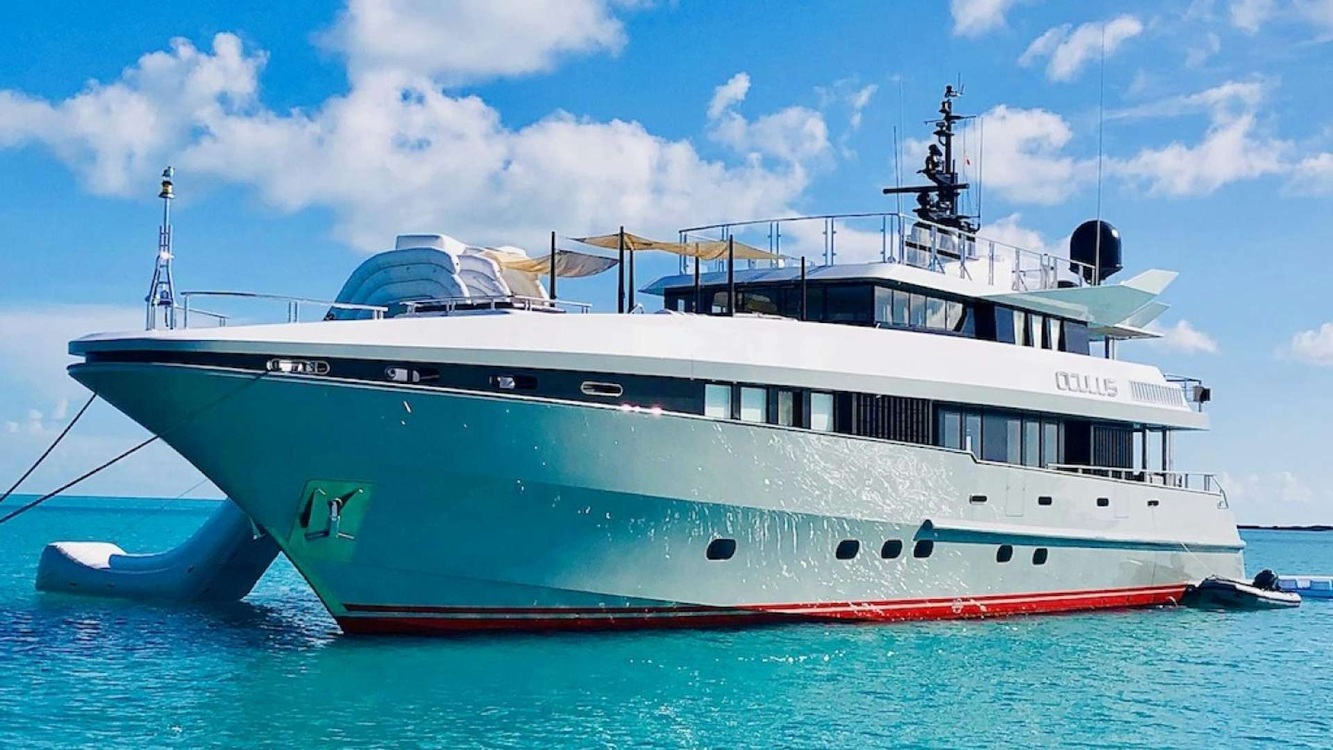 a large boat in the water aboard OCULUS Yacht for Sale