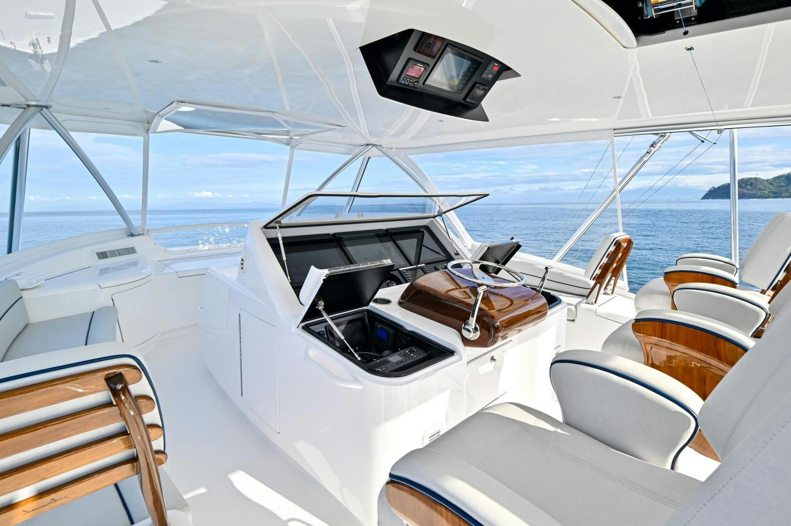 a yacht with a laptop on the deck aboard EL LOBO Yacht for Sale