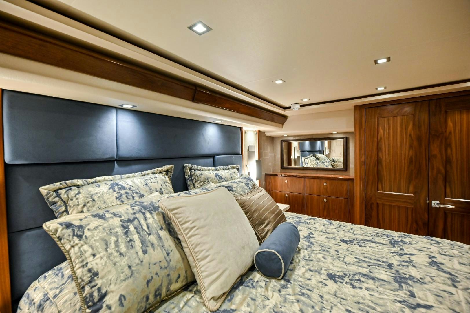 a bed with pillows aboard EL LOBO Yacht for Sale