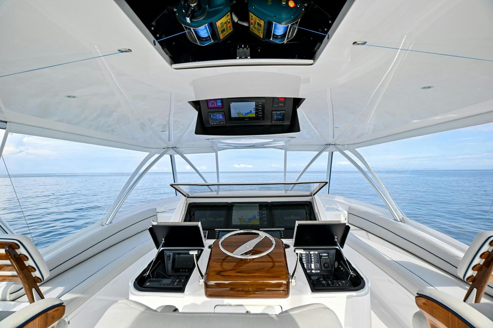 a boat with a few laptops on it aboard EL LOBO Yacht for Sale