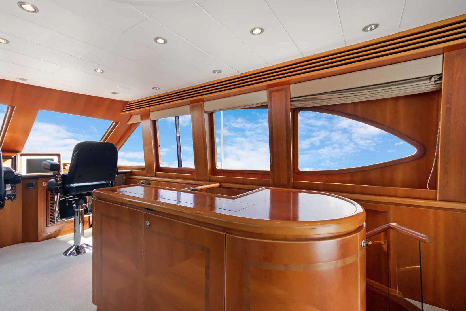 a room with a chair and a desk aboard B HAPPY Yacht for Sale