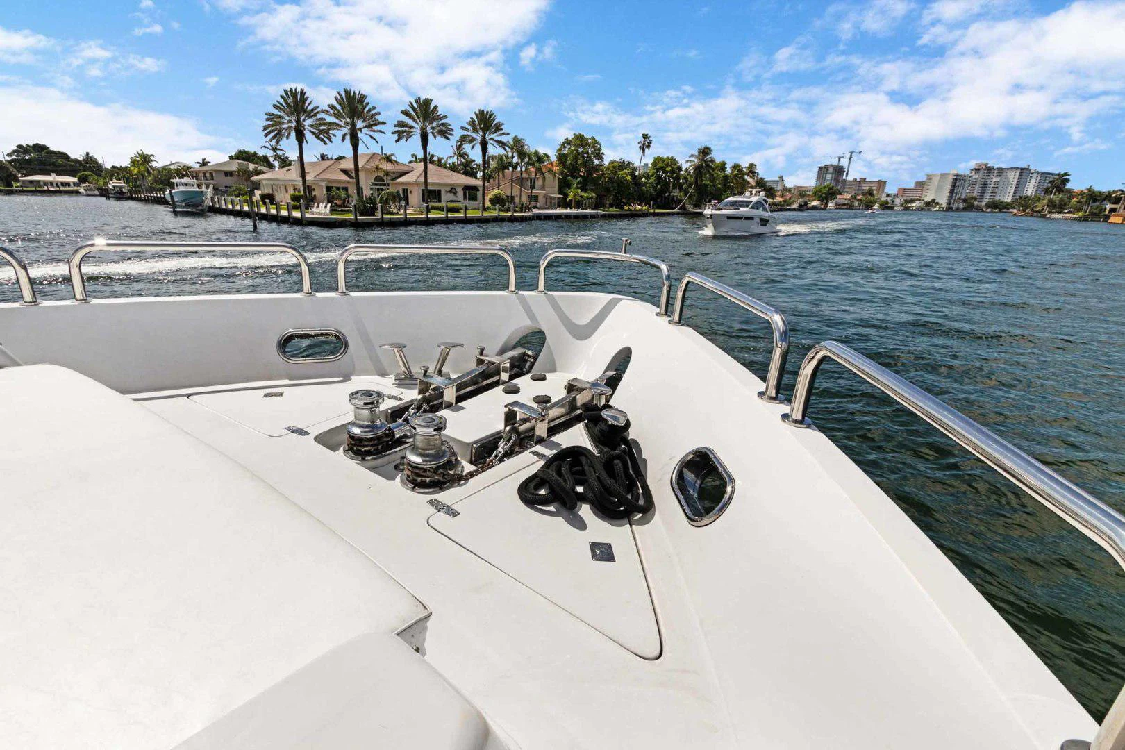a boat with a motor and steering wheel on it aboard B HAPPY Yacht for Sale
