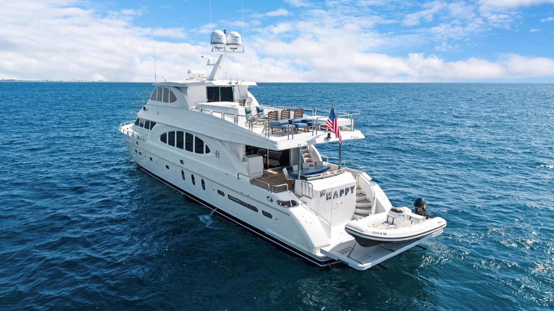a large white boat in the water aboard B HAPPY Yacht for Sale