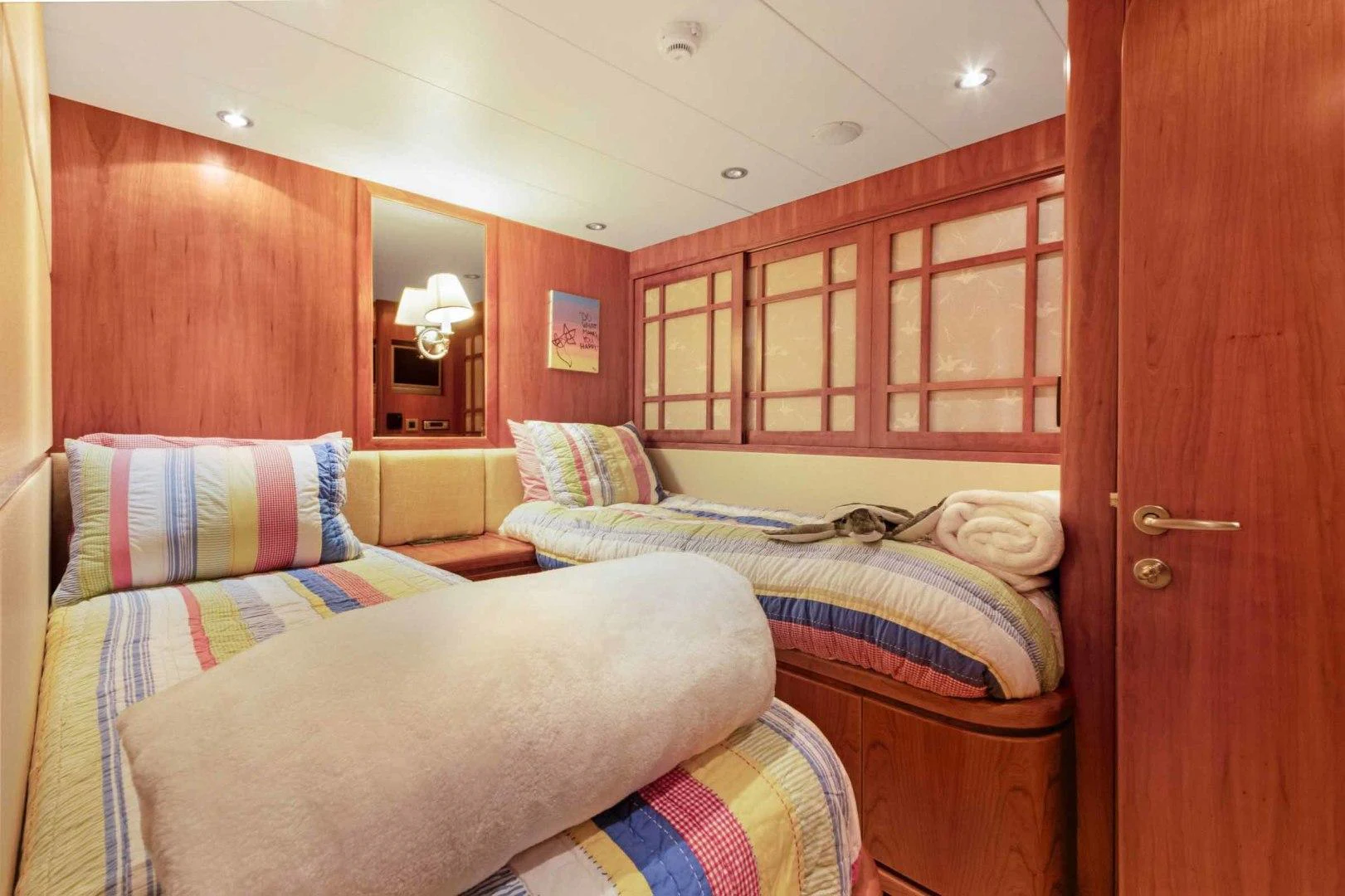 a couple of beds in a room aboard B HAPPY Yacht for Sale
