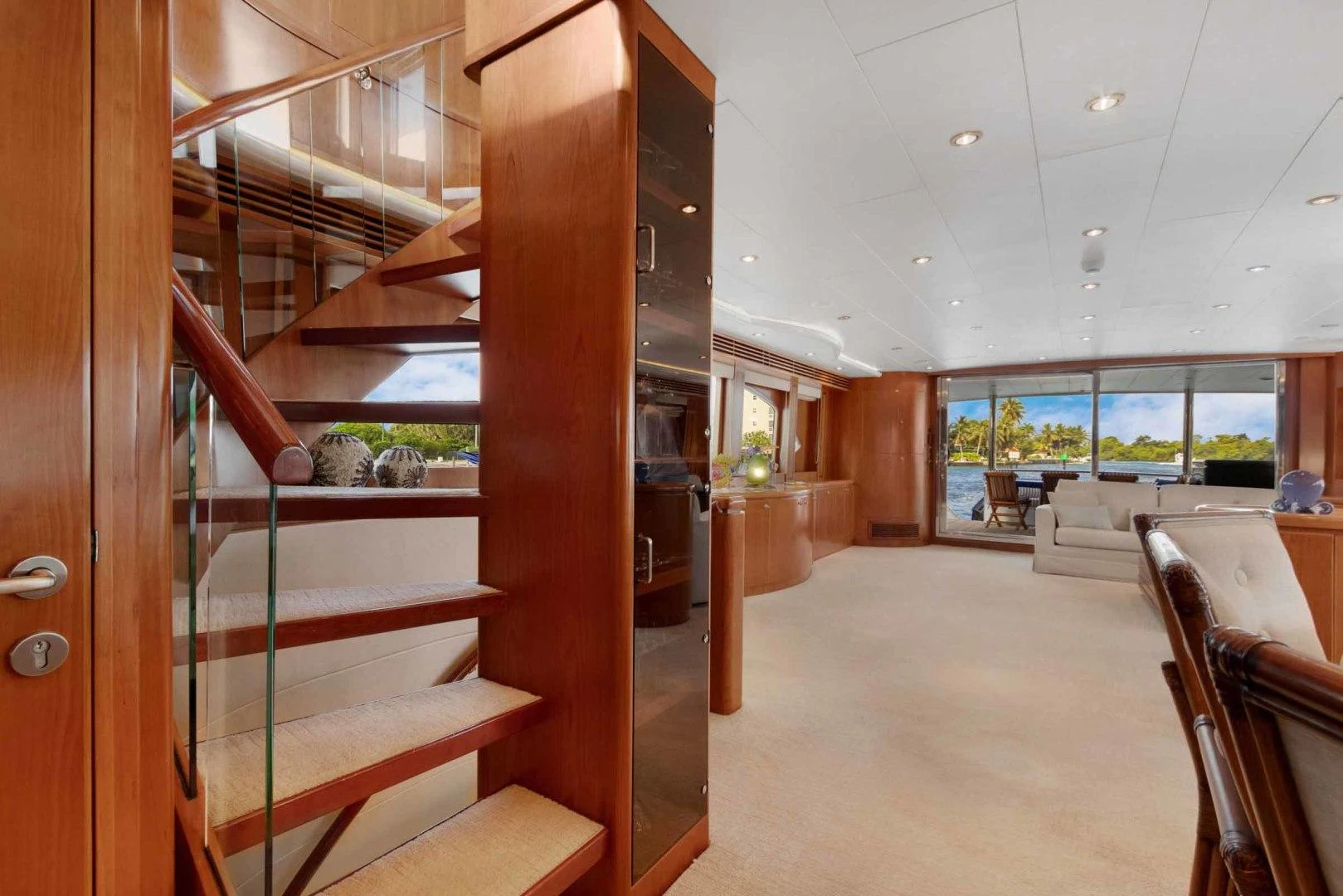 a room with wooden furniture aboard B HAPPY Yacht for Sale