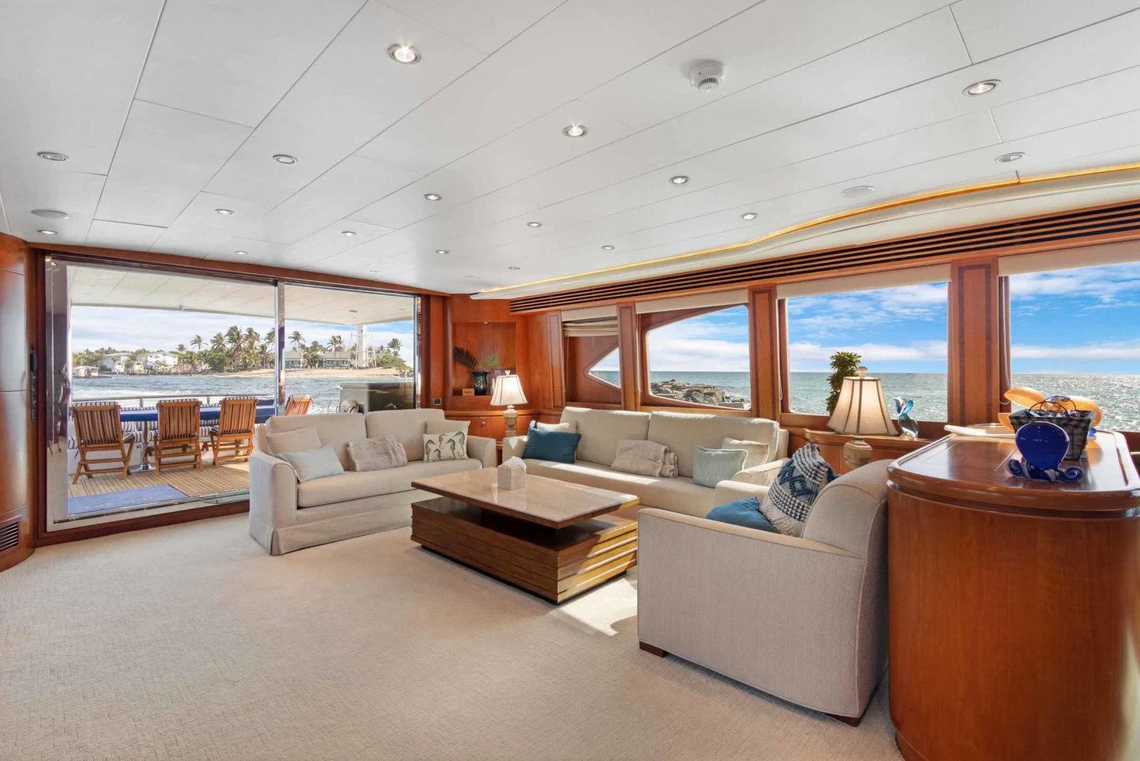 a living room with a large window aboard B HAPPY Yacht for Sale