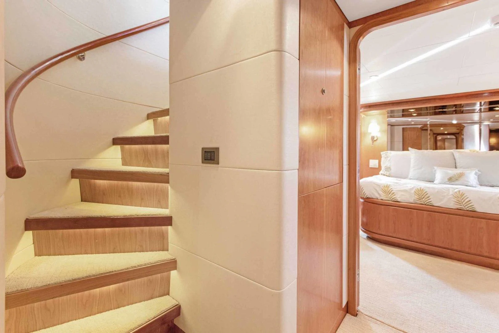 a room with a bed and a staircase aboard B HAPPY Yacht for Sale