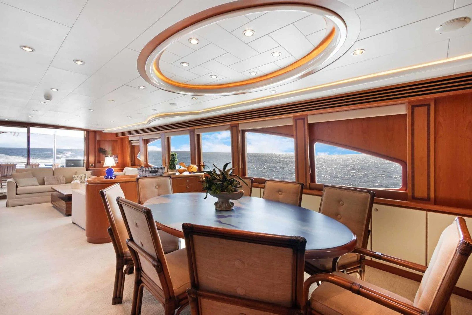 a large dining room with a large table and chairs aboard B HAPPY Yacht for Sale