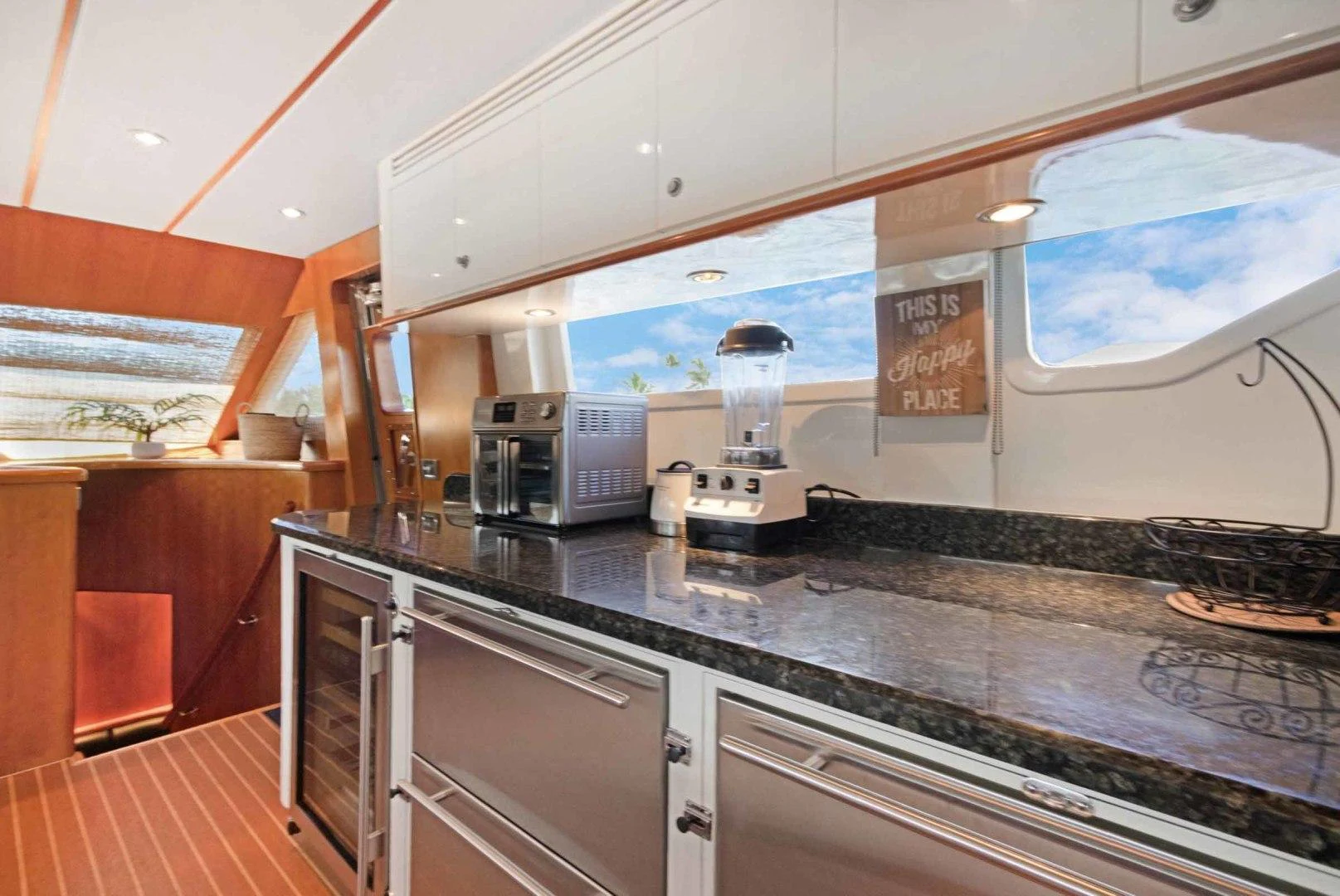 a kitchen with a large island aboard B HAPPY Yacht for Sale