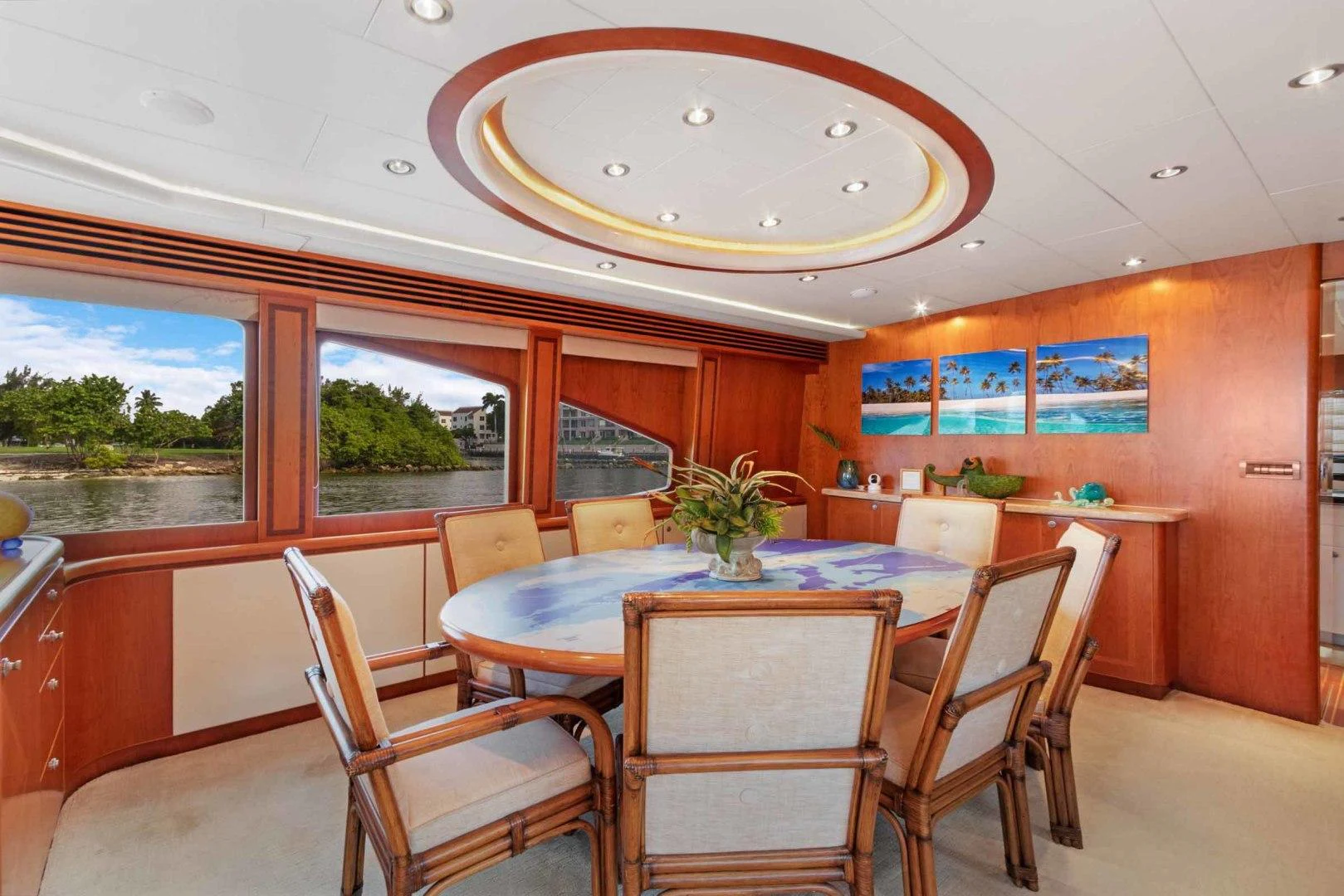 a dining room with a table and chairs aboard B HAPPY Yacht for Sale