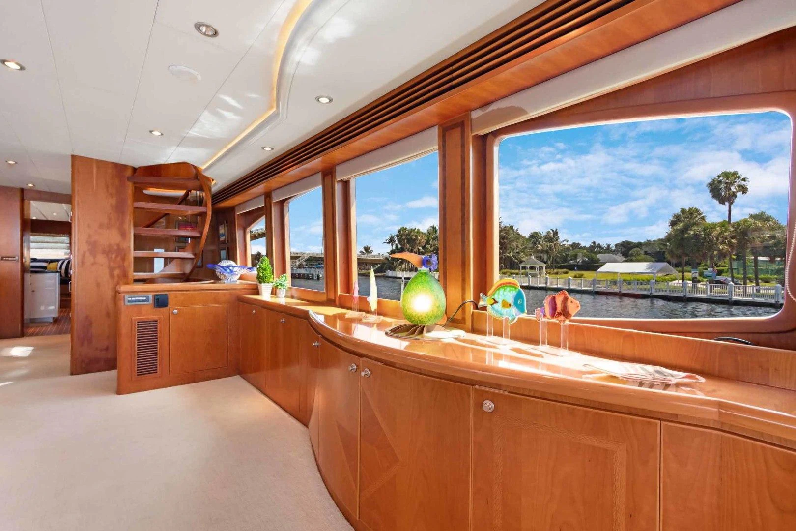 a large open area with a large window and a view of the water aboard B HAPPY Yacht for Sale