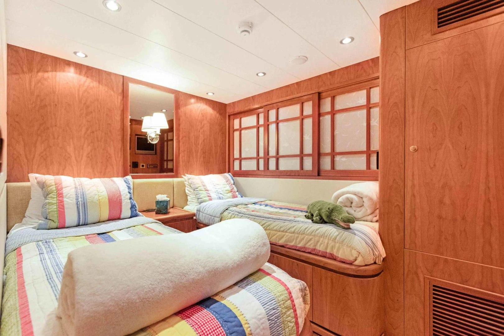 a couple of beds in a room aboard B HAPPY Yacht for Sale