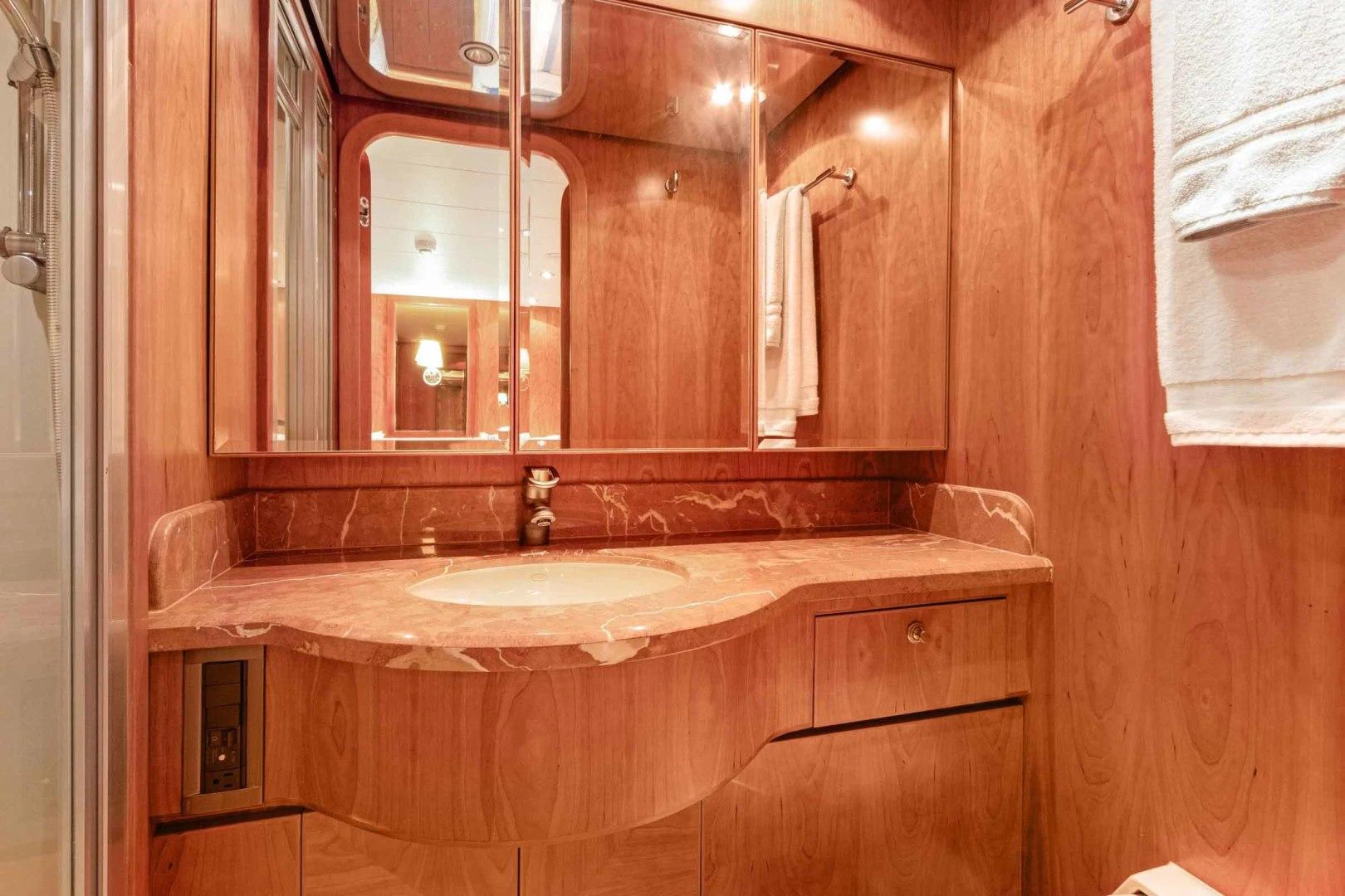 a bathroom with a large mirror aboard B HAPPY Yacht for Sale