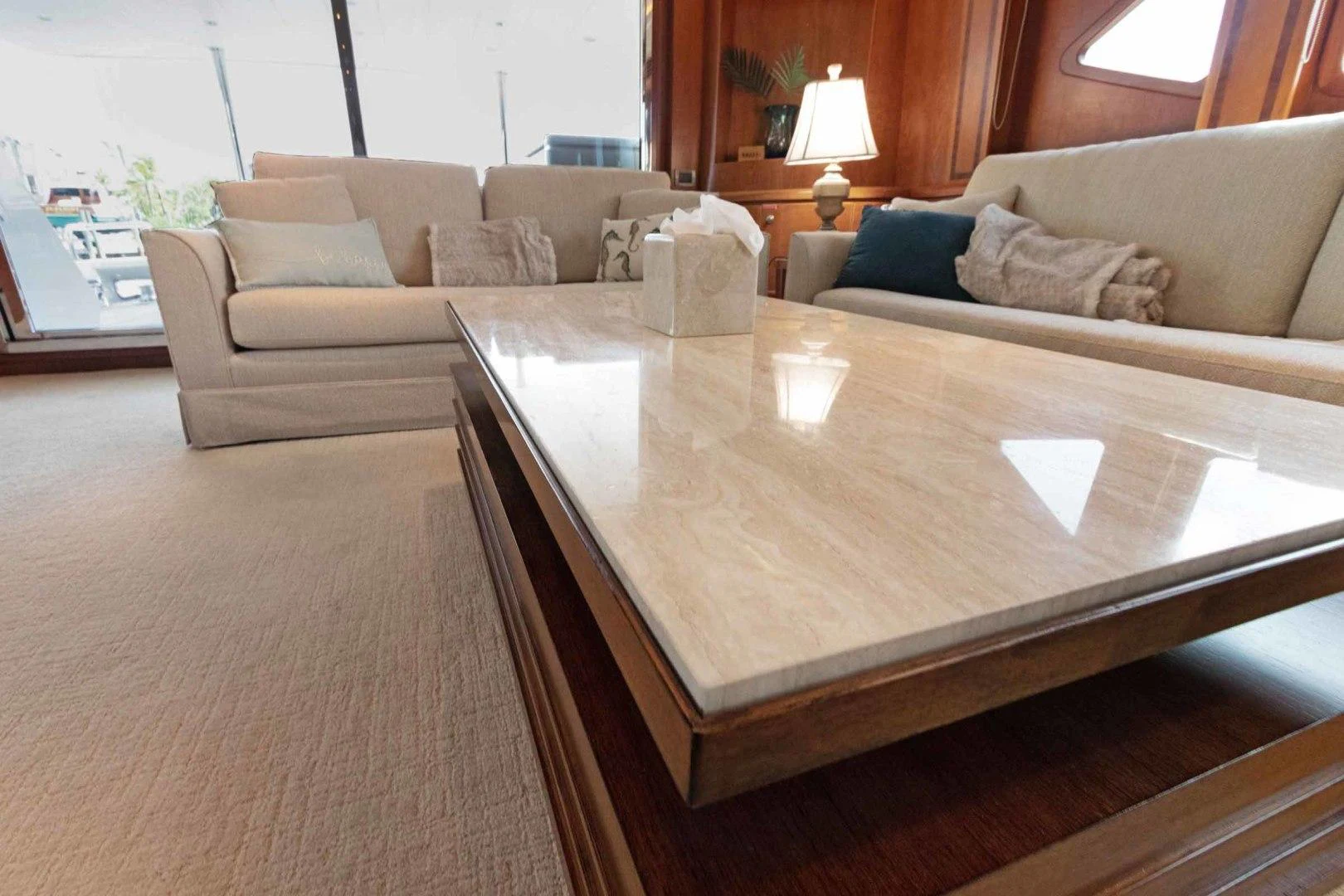 a living room with a couch and a coffee table aboard B HAPPY Yacht for Sale