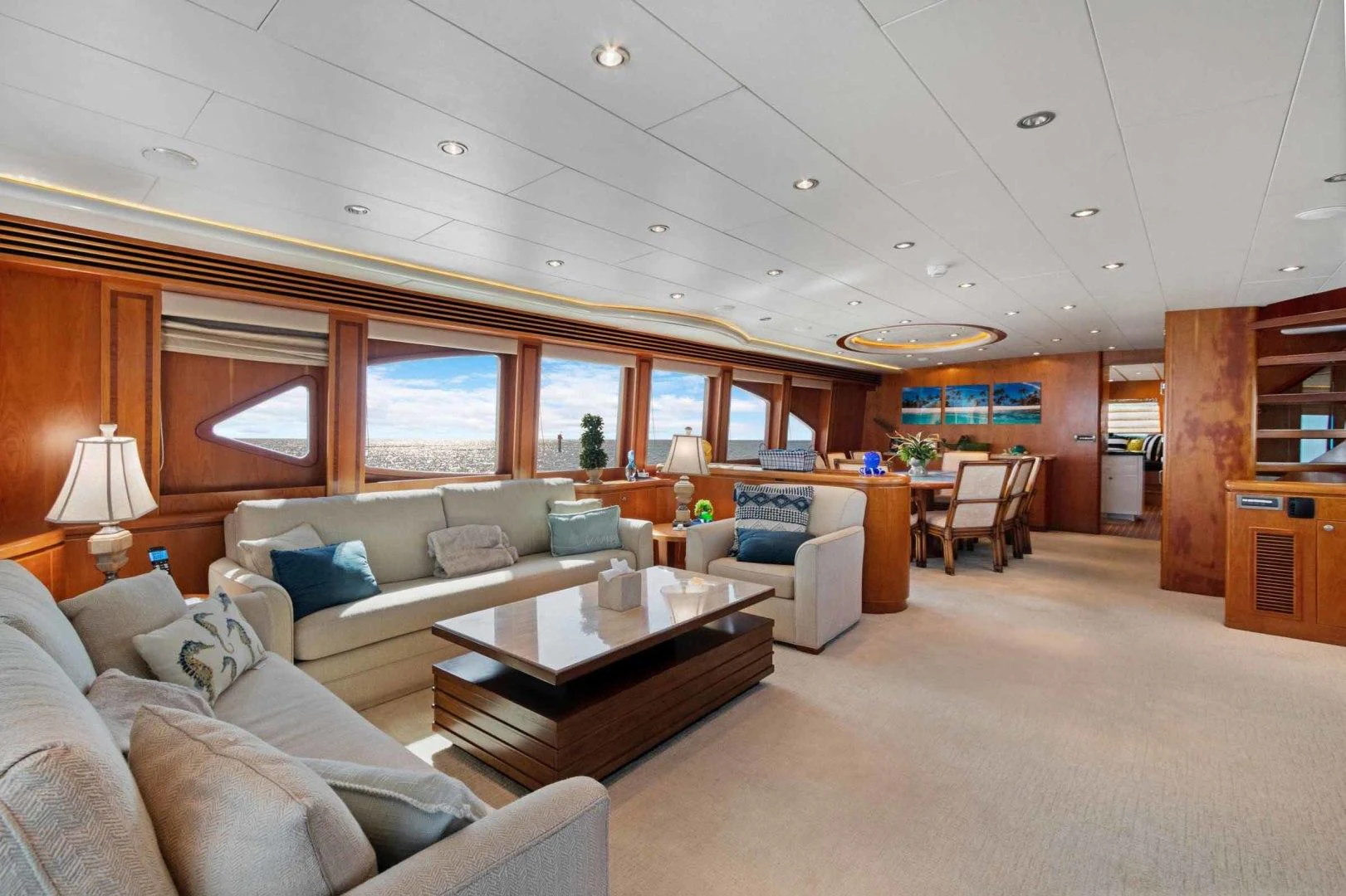 a living room with a couch and a coffee table aboard B HAPPY Yacht for Sale