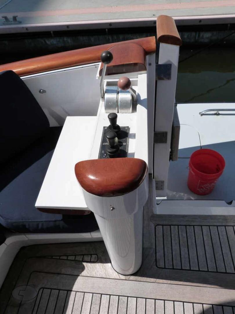 a toilet with a wooden seat aboard RANGELEY Yacht for Sale