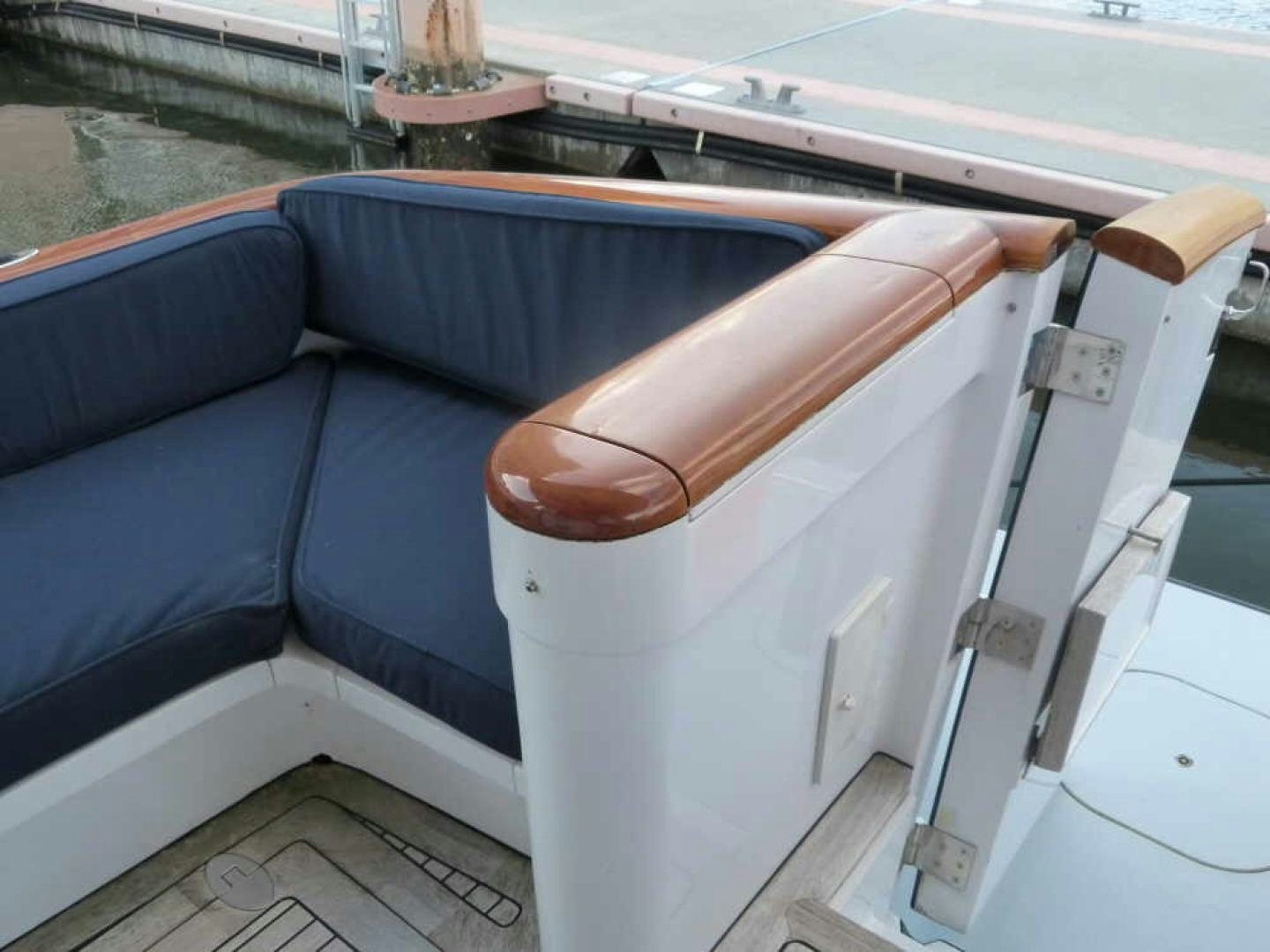 a boat with a seat aboard RANGELEY Yacht for Sale