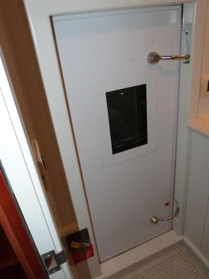 a white electrical outlet aboard RANGELEY Yacht for Sale