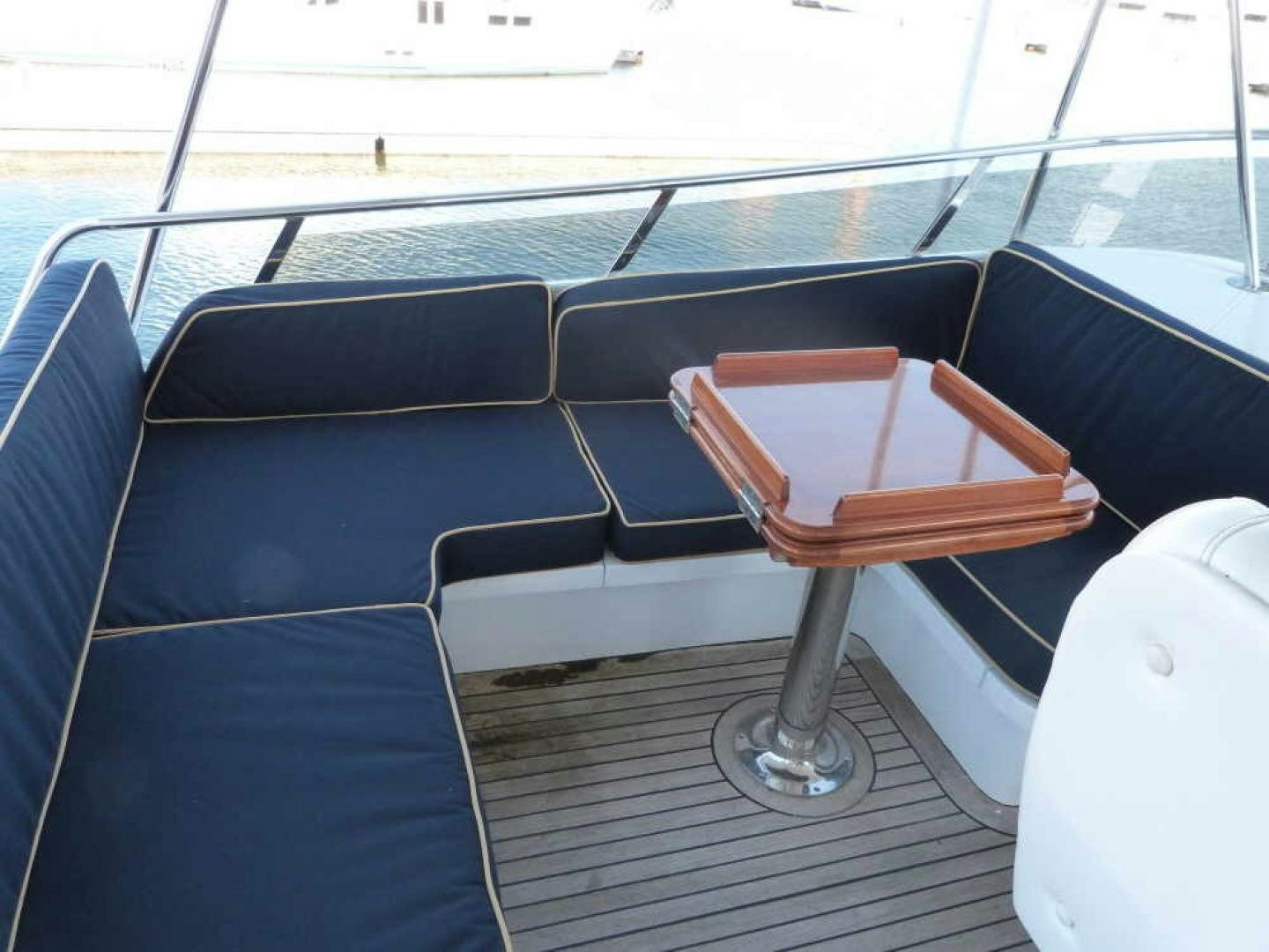 a chair and a table on a bus aboard RANGELEY Yacht for Sale