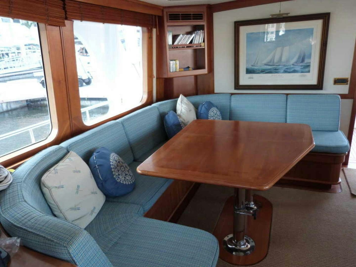 a living room with a couch and a table aboard RANGELEY Yacht for Sale