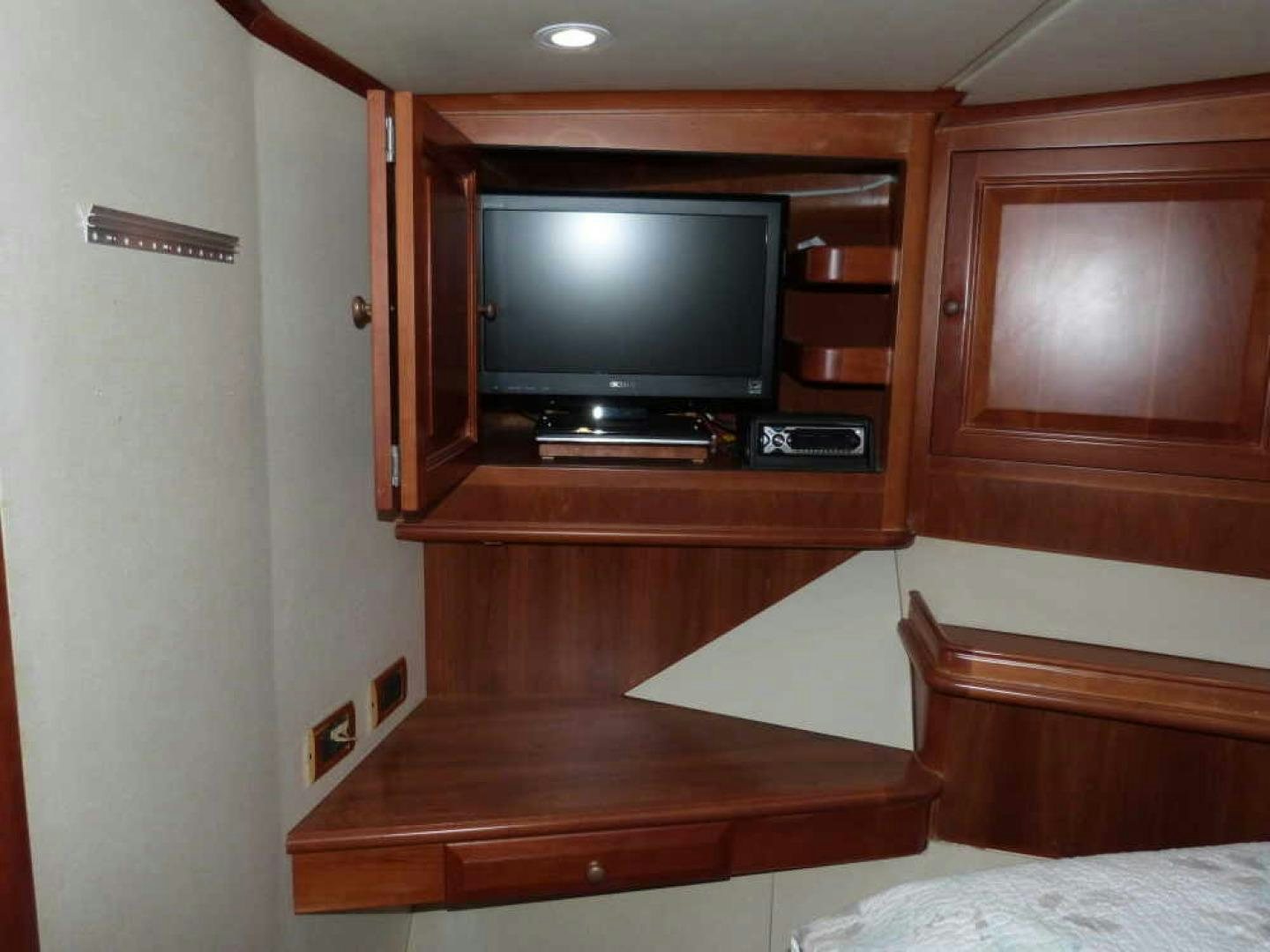 a tv on a cabinet aboard RANGELEY Yacht for Sale