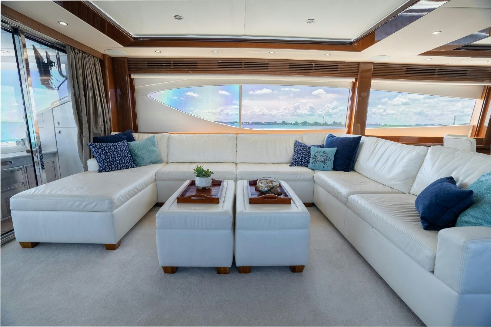 a living room with a large window aboard STEPHANIE Yacht for Sale