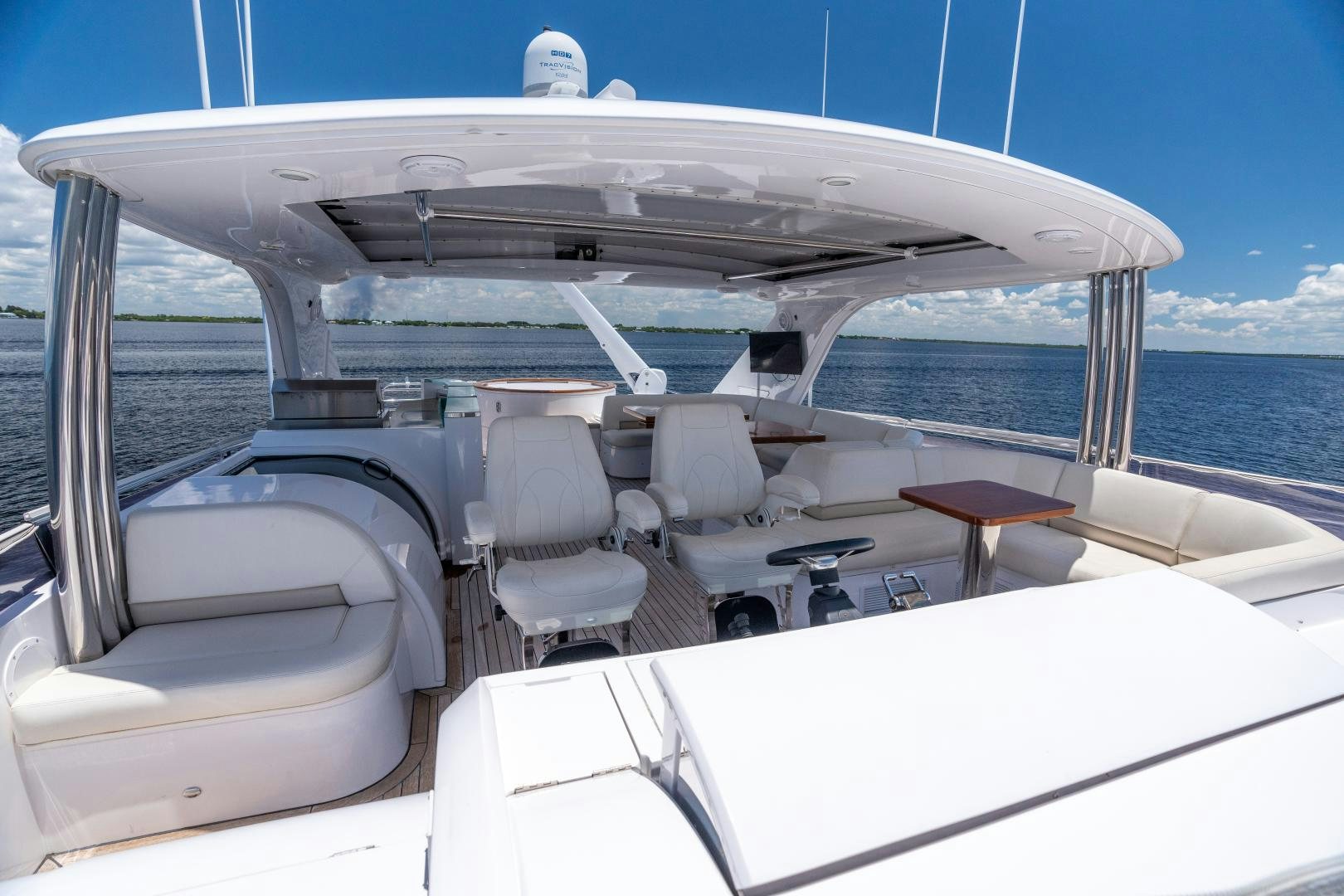 a boat with a table and chairs on it aboard STEPHANIE Yacht for Sale