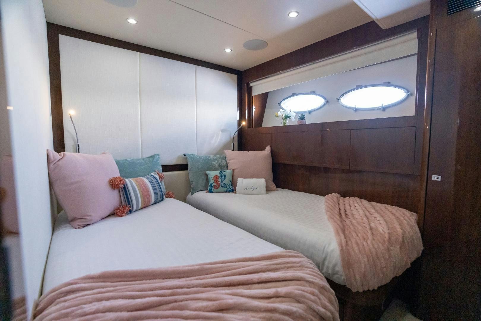 a couple of beds in a hotel room aboard STEPHANIE Yacht for Sale