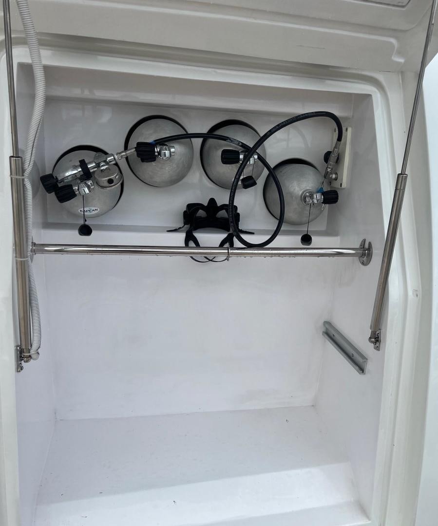 a white cabinet with a metal rack aboard STEPHANIE Yacht for Sale