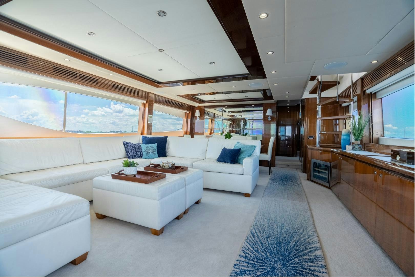 a living room with a large window aboard STEPHANIE Yacht for Sale