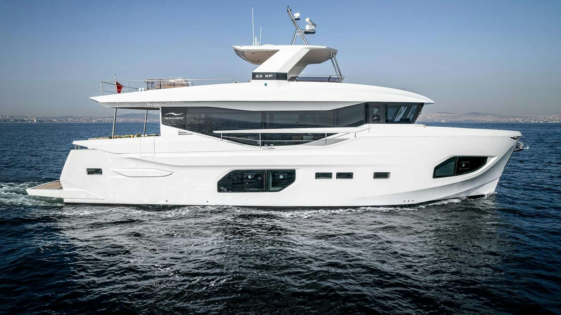 a white yacht in the water aboard Numarine 22xp Yacht for Sale