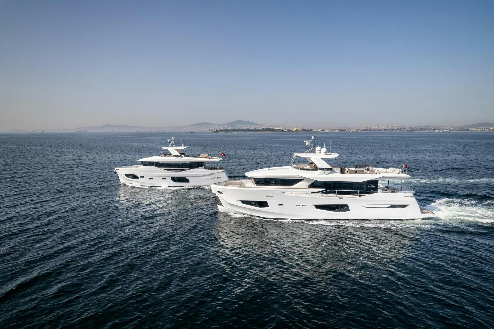 a group of boats in the water aboard NUMARINE 22XP Yacht for Sale