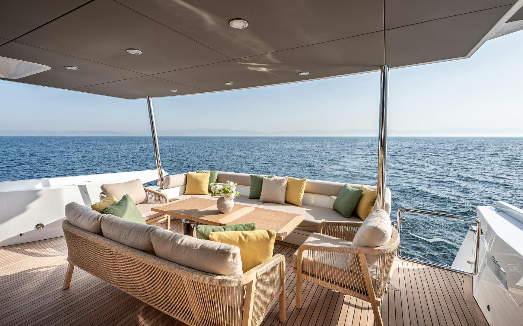 a living room with a large body of water aboard NUMARINE 22XP Yacht for Sale