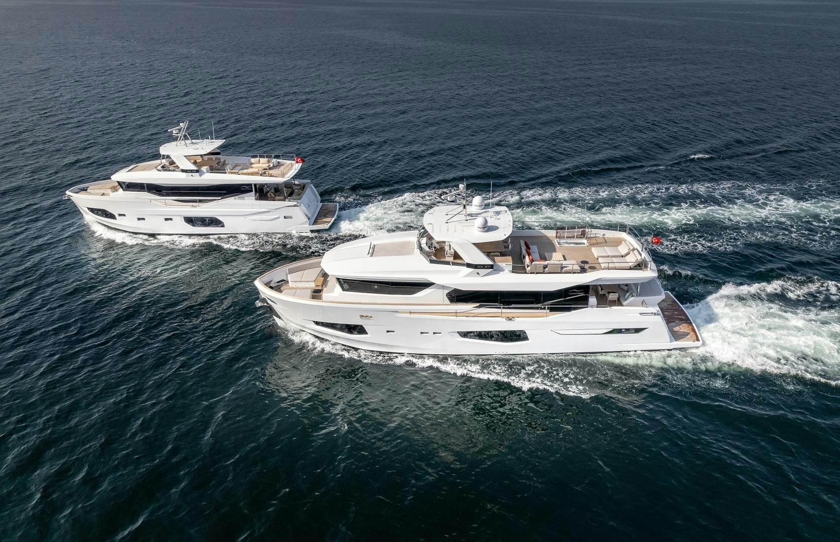 a group of boats in the ocean aboard NUMARINE 22XP Yacht for Sale
