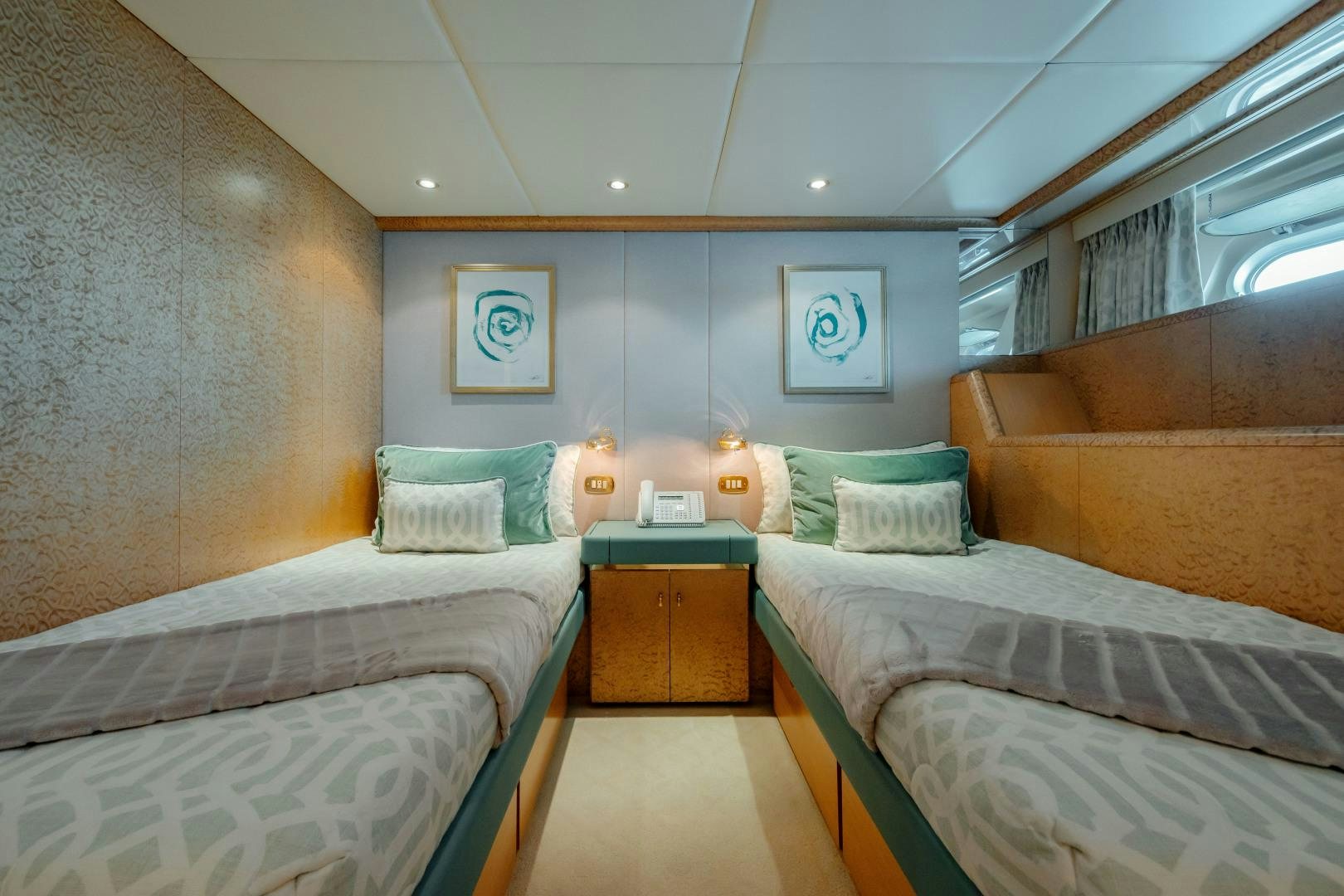 a room with two beds aboard CAPRICE Yacht for Sale